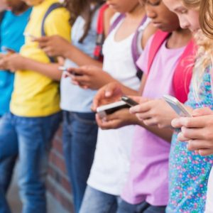 Teens spend more than a quarter of their time at school on phones, new study finds