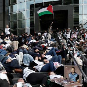 ‘Die-in’ held in Paris to protest killing of Palestinian journalists