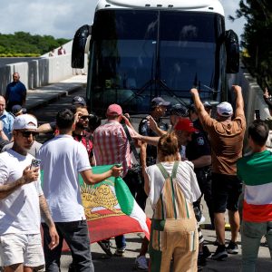 Protesters block Iran’s women’s football team bus en route to airport