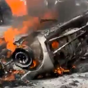 Vehicles burn in Israel after being hit with Iranian projectile debris