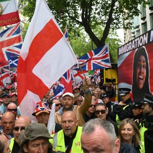 Activists troll far-right UK rally with giant pro-immigration clip