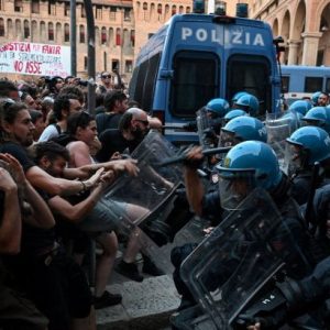 Clashes between police and people protesting Italy arrest death