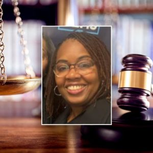 Democrat House candidate hit with felony summons at campaign event
