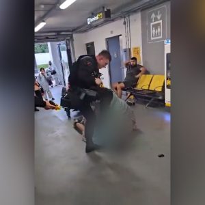 UK police officer filmed kicking man in the face