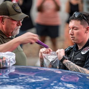Suspect arrested outside Paxton HQ with ammo in car following disturbance