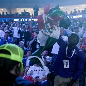 Crowd erupts as Vance smacks down protester waving Mexican flag: ‘Get your a– over there’