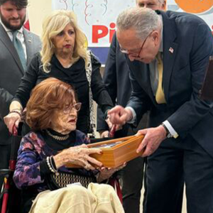 ‘Living legend’: Schumer honors centenarian Holocaust survivor with Capitol flag, Senate floor recognition