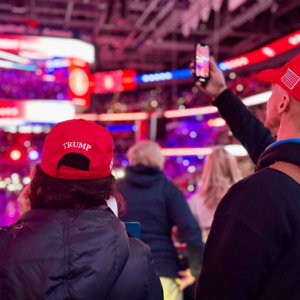 Trump fans endure frigid temps, sleet and snow for a chance to see president-elect