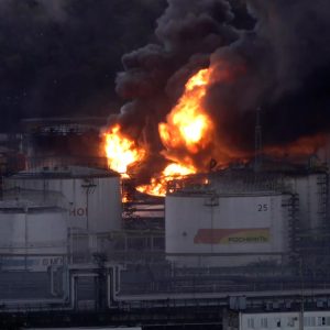 Fires ignited by Ukrainian drones rage at Russian oil refinery