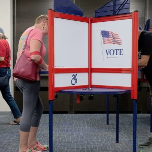 Political newcomer seeks to unseat twin of Trump impeachment foe in swing Virginia district