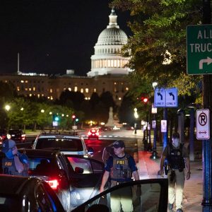 Protesters confront officers patrolling DC streets after Trump policing takeover